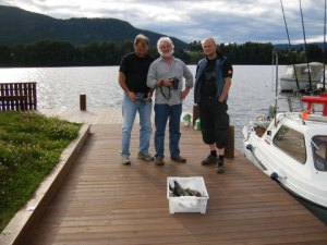 Stolte fiskere med fangsten